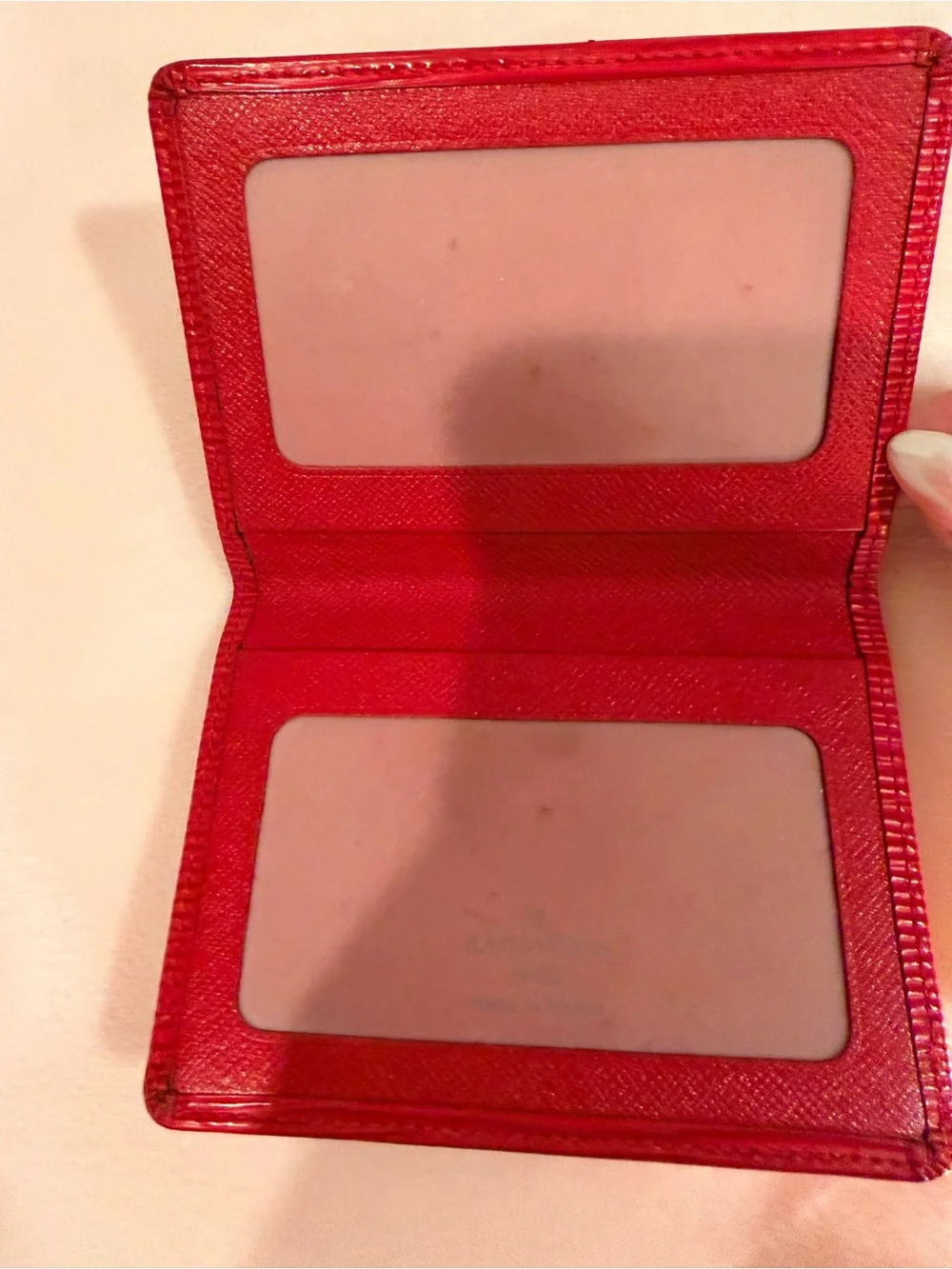Signature Louis Vuitton textured Epi leather slim wallet
